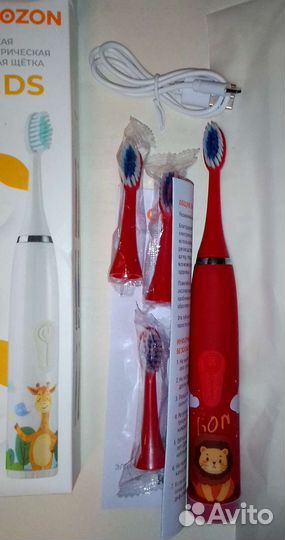 Новая электрическая зубная щетка