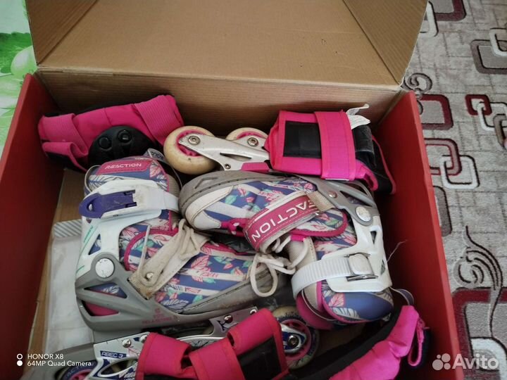 Роликовые коньки