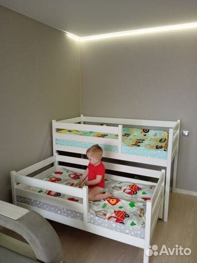 Двубортная детская кровать высокая