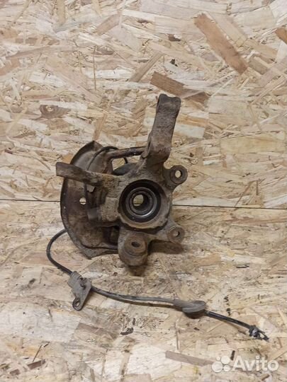 Кулак поворотный левый под абс Almera Classic