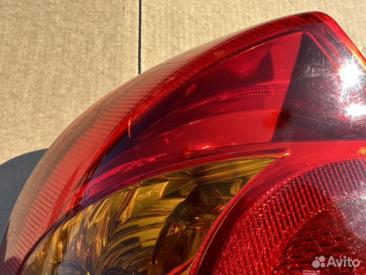 Фонарь задний левый Kia Spectra