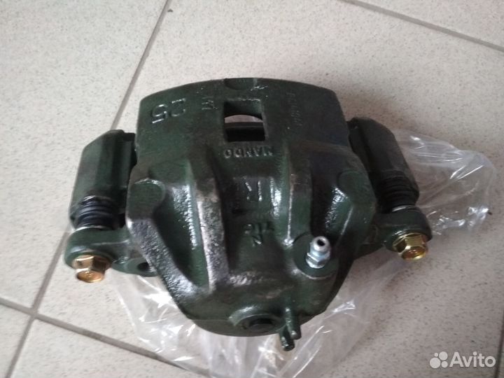 Суппорт передний правый Киа рио и Солярис