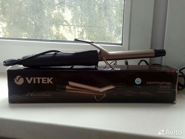 Электрощипцы для завивки волос