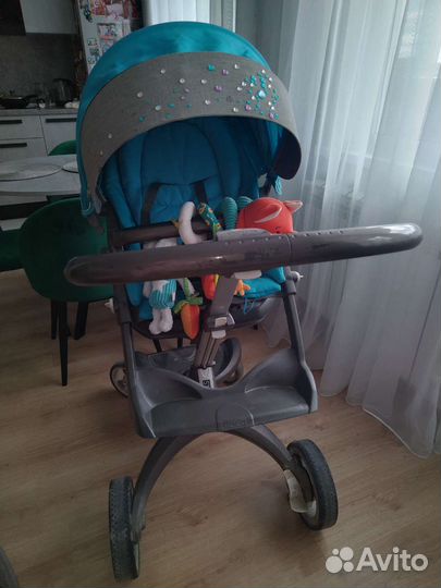 Коляска stokke