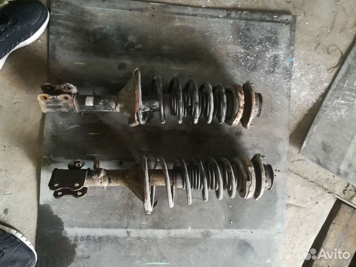 Стойки амортизатора заднее kia спектр