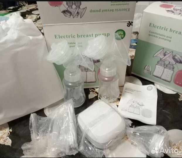 Молокоотсос электрический новый