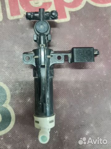 Форсунка омывателя фары Subaru Legacy Outback