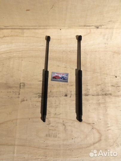 Амортизатор крышки багажника Volkswagen Passat B6