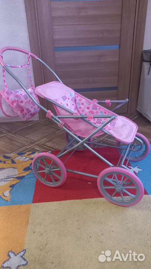 Игрушечная коляска для кукол