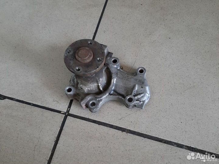 Помпа Mitsubishi Lancer 9