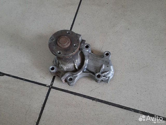 Помпа Mitsubishi Lancer 9