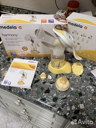 Молокоотсос Medela