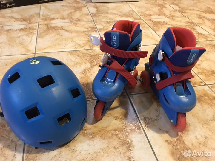 Роликовые коньки и шлем