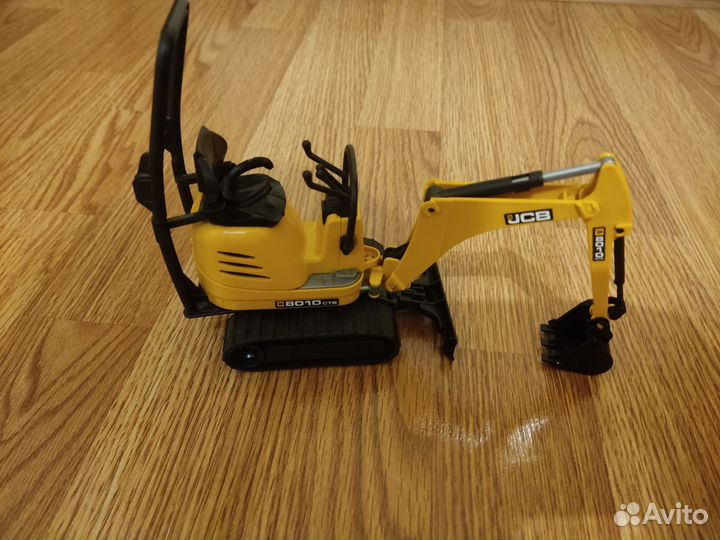 Игрушечный экскаватор Bruder