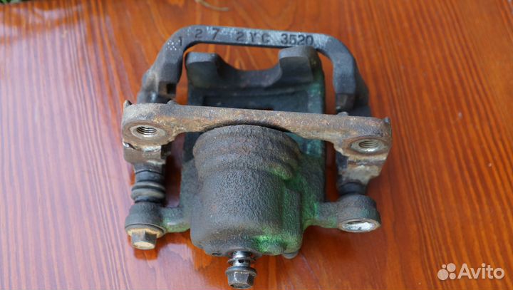 Суппорт тормозной задний правый 3520 44001JG00A