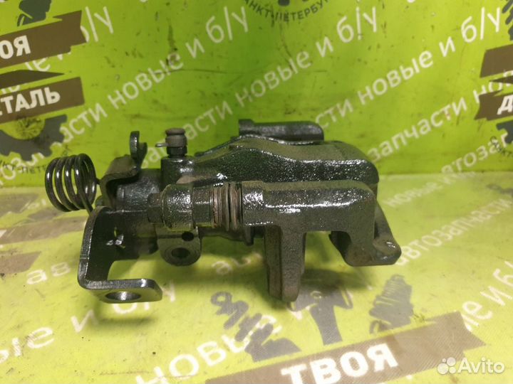 Суппорт со скобой задний левый Kia Rio 3 Solaris