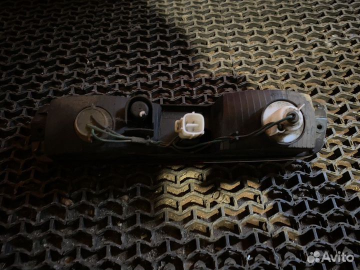 Фонарь противотуманный задний левый Поджеро 3