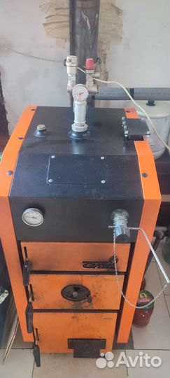 Твëрдотопливный котёл длительного горения