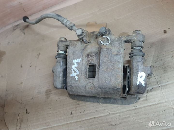 Суппорт задний правый kia sorento 2 xm