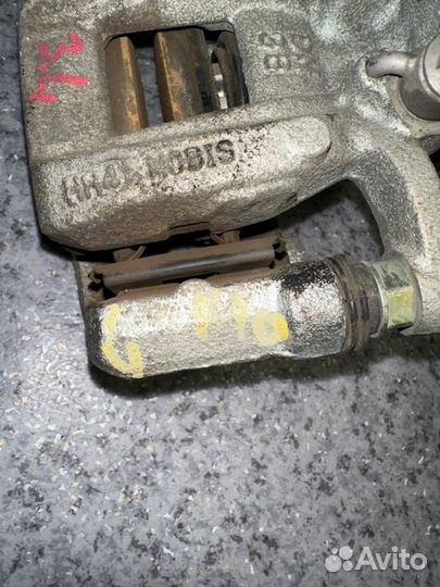 Суппорт задний левый Kia K5 DL3 G4KN 2021