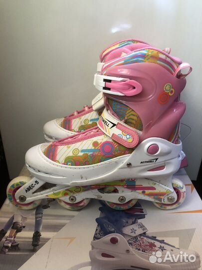 Роликовые коньки