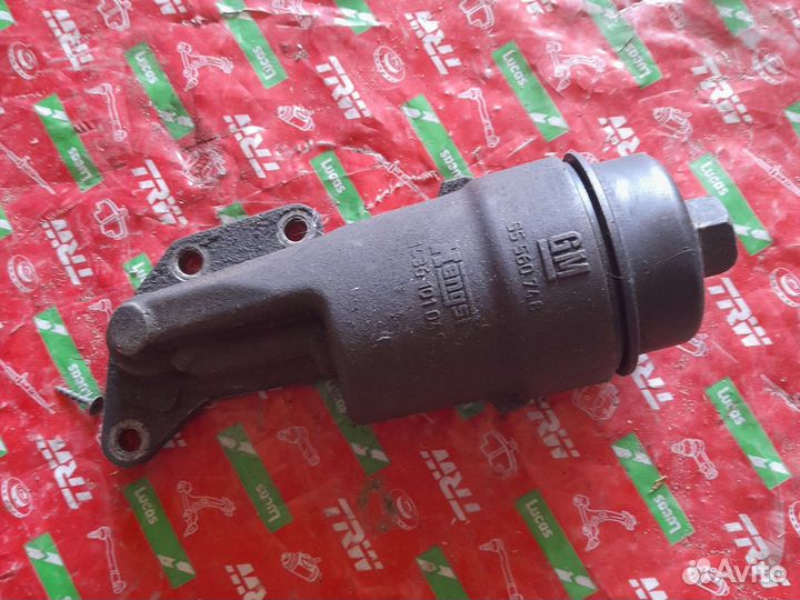 Корпус масляного фильтра Опель Корса D