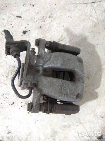 Суппорт тормозной задний правый Volkswagen Passat