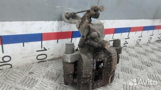 Суппорт тормозной задний левый peugeot 308 2 (7AG03LS01)