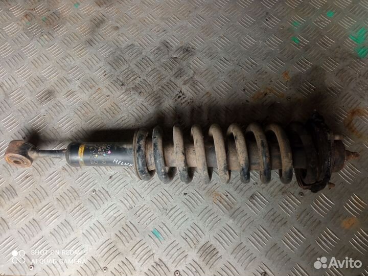 Стойка амортизатора передняя Toyota Hilux 7