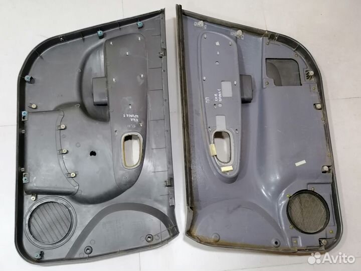 Обшивка (карта) передней двери Kia Sephia/Shuma 1