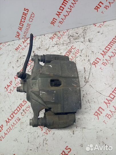 Суппорт тормозной передний левый Mazda 6 GJ седан