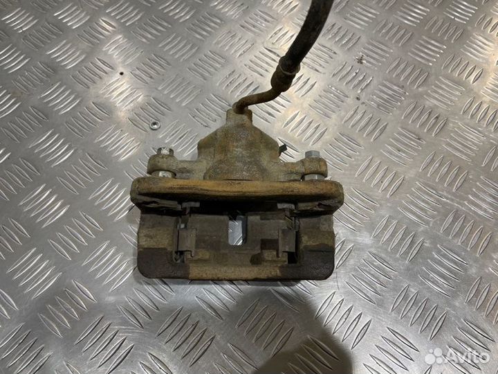 Суппорт тормозной задний левый Kia Cerato купе 2.0