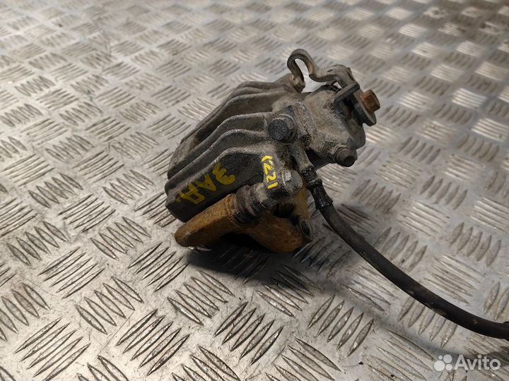 Суппорт тормозной задний правый Skoda Rapid