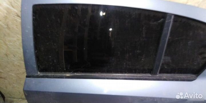 Стекло двери заднее правое Opel Astra H