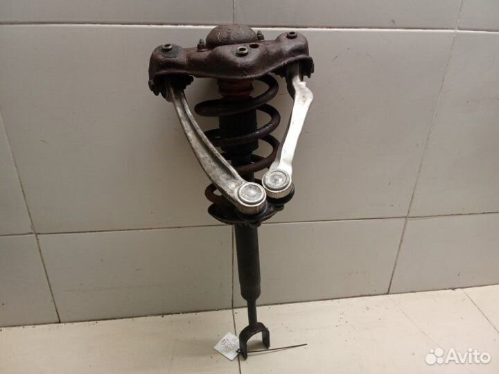 Амортизатор стойка передний левый Volkswagen