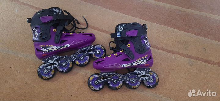 Роликовые коньки