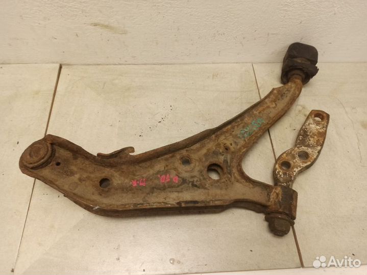 Рычаг передний левый нижний