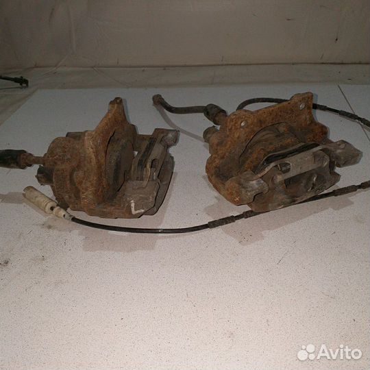 Суппорт тормозной задний левый BMW 3 E90