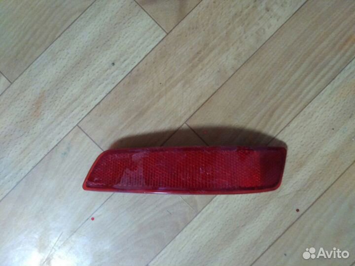 Левый отражатель для заднего бампера Toyota Coroll