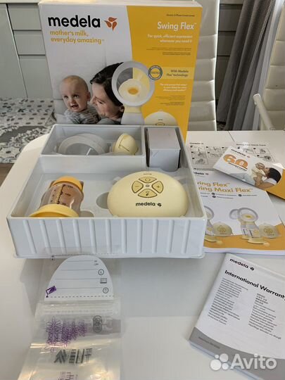 Молокоотсос medela swing flex электрический
