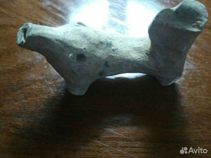 Древняя свистулька из глины