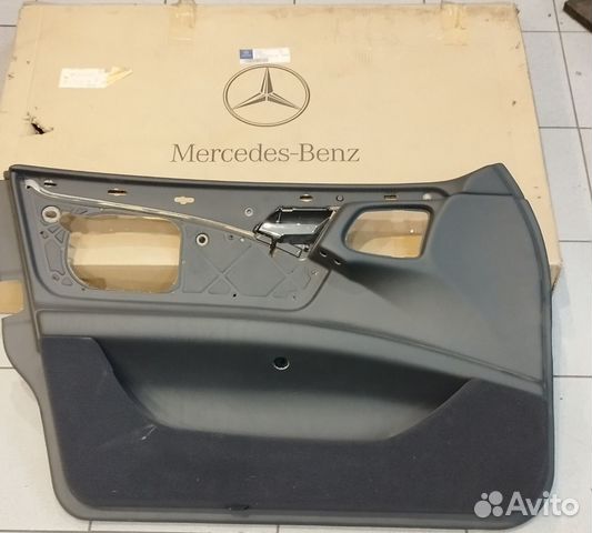Обшивка двери передняя левая mercedes W 210