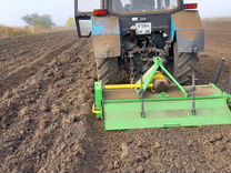 Обработка почвы трактором