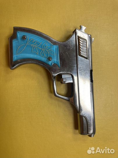 Зажигалка в виде пистолета