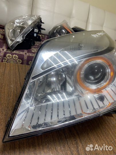 Фара левая Geely MK Cross 11-16г