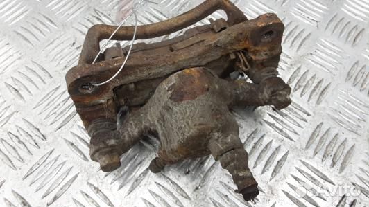 Суппорт тормозной задний правый mitsubishi galant