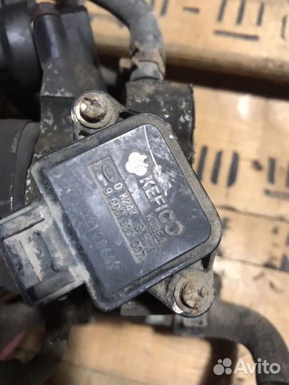 Дросельная заслонка Kia Rio 1