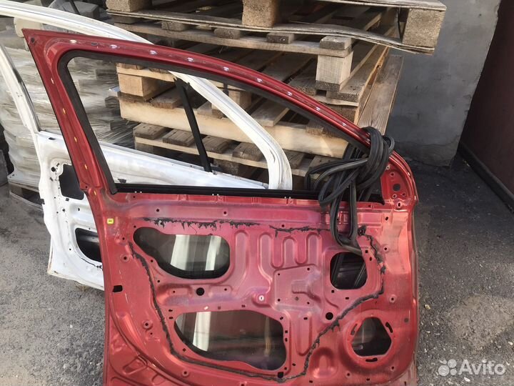 Дверь передняя левая lancer 10
