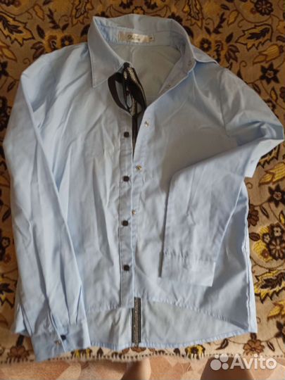 Блузки на девочку 134