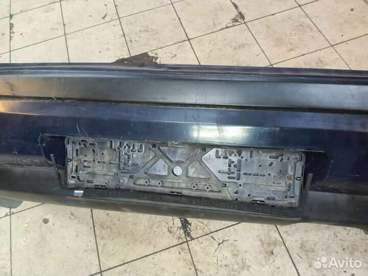 Задний бампер Mazda 323 BG слепая